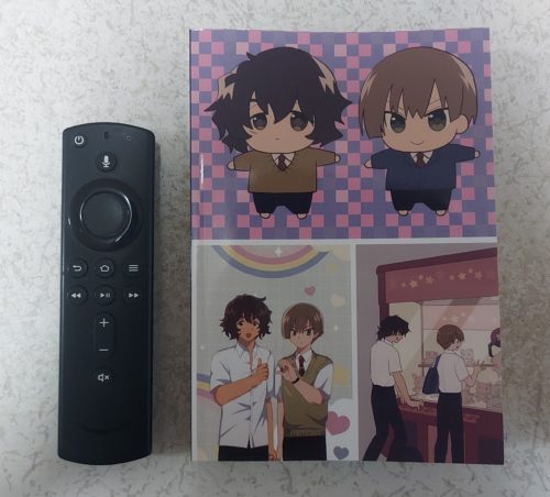 裏表紙の写真。サイズ比較にAmazon棒。